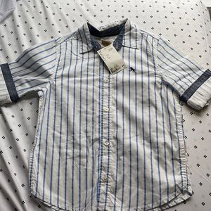 It’s a boy shirt a for a kid never been used and good Quality